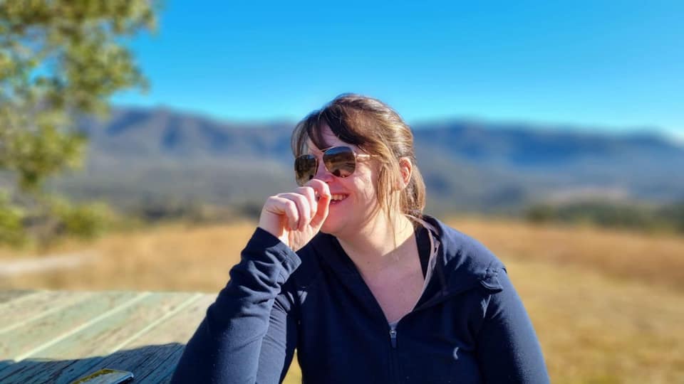 Amy laughing while in nature